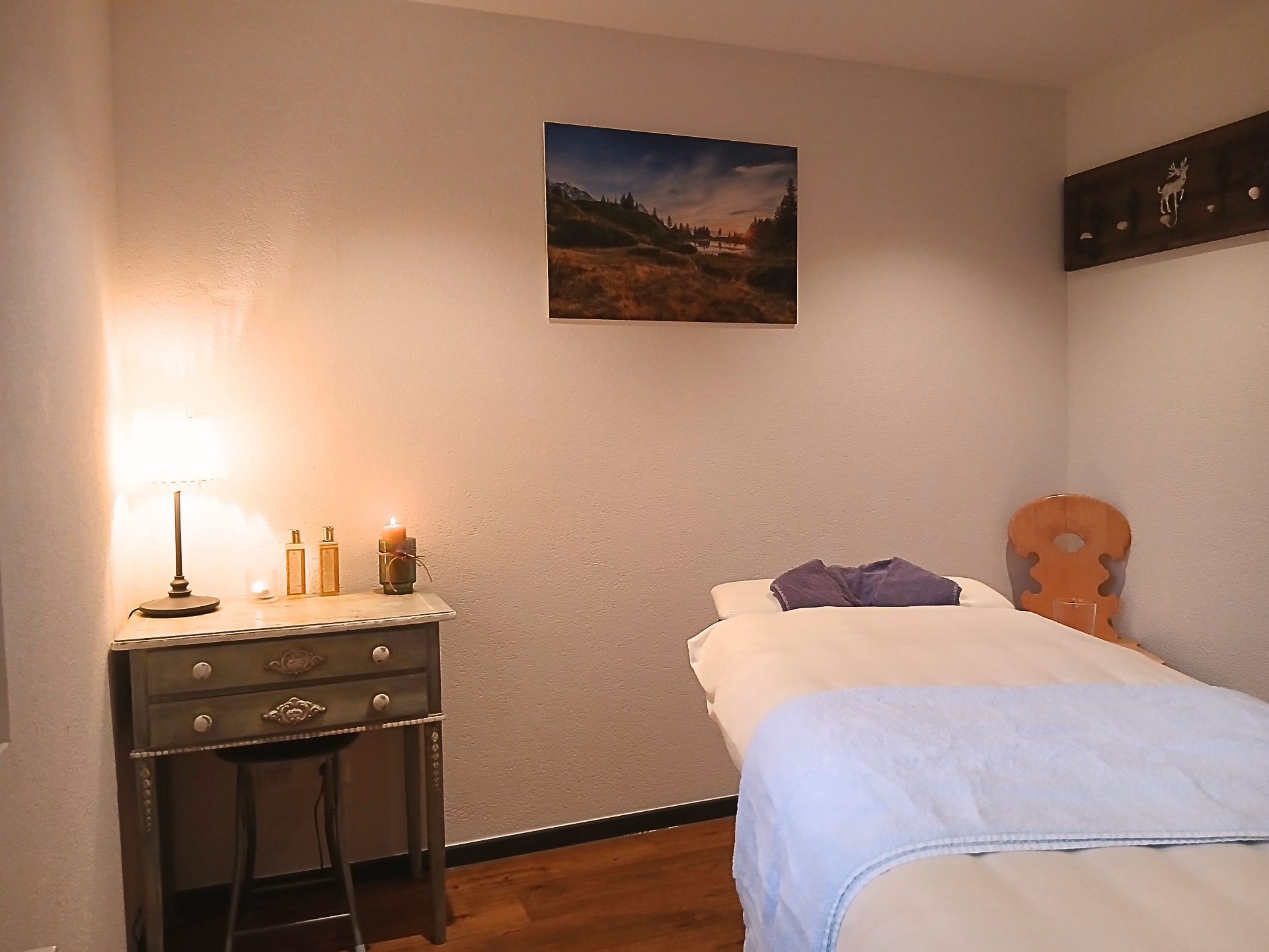 Guests relaxing with a mountain view in a hotel wellness lounge